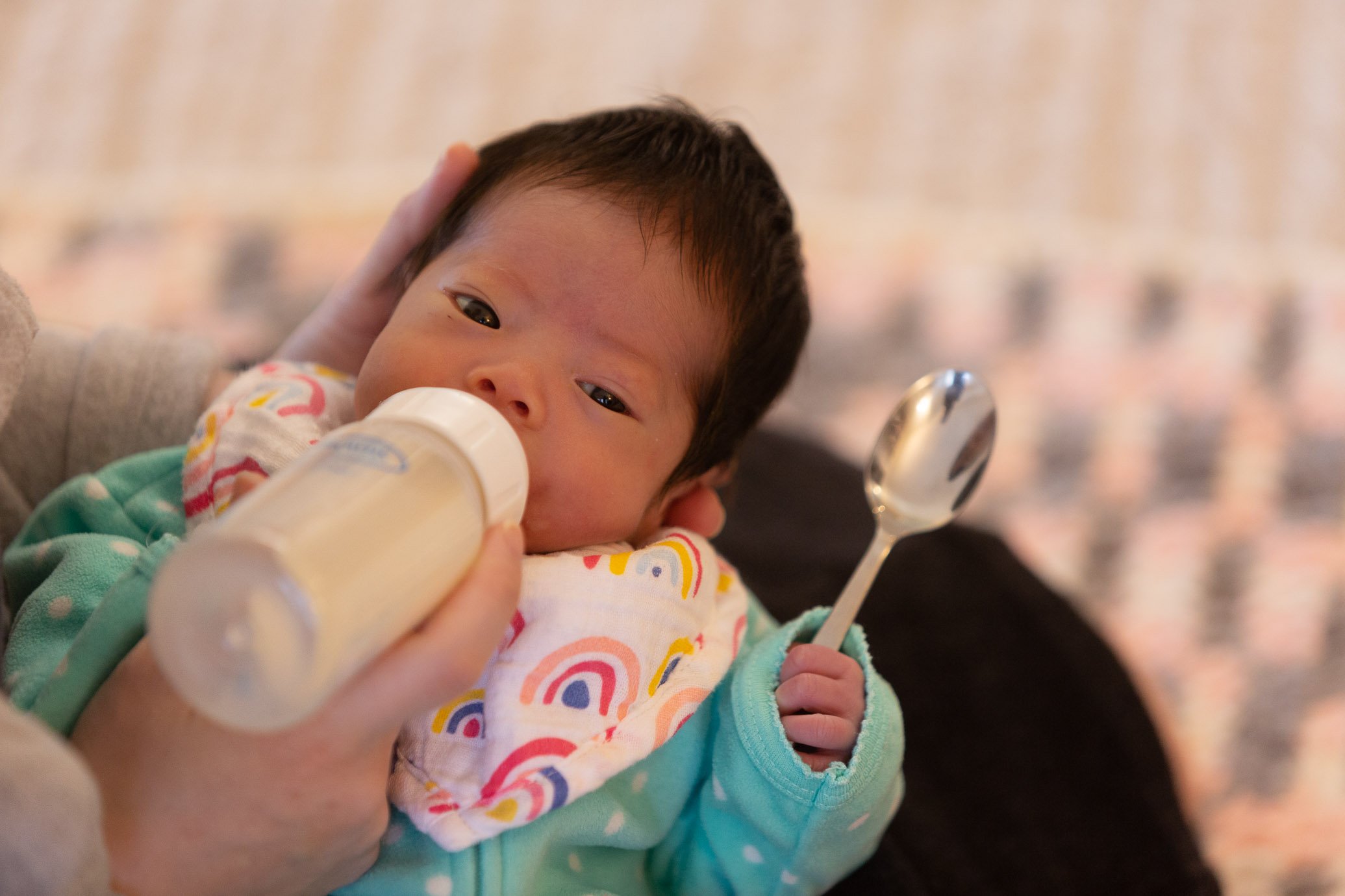 Cece eating with clenched fists